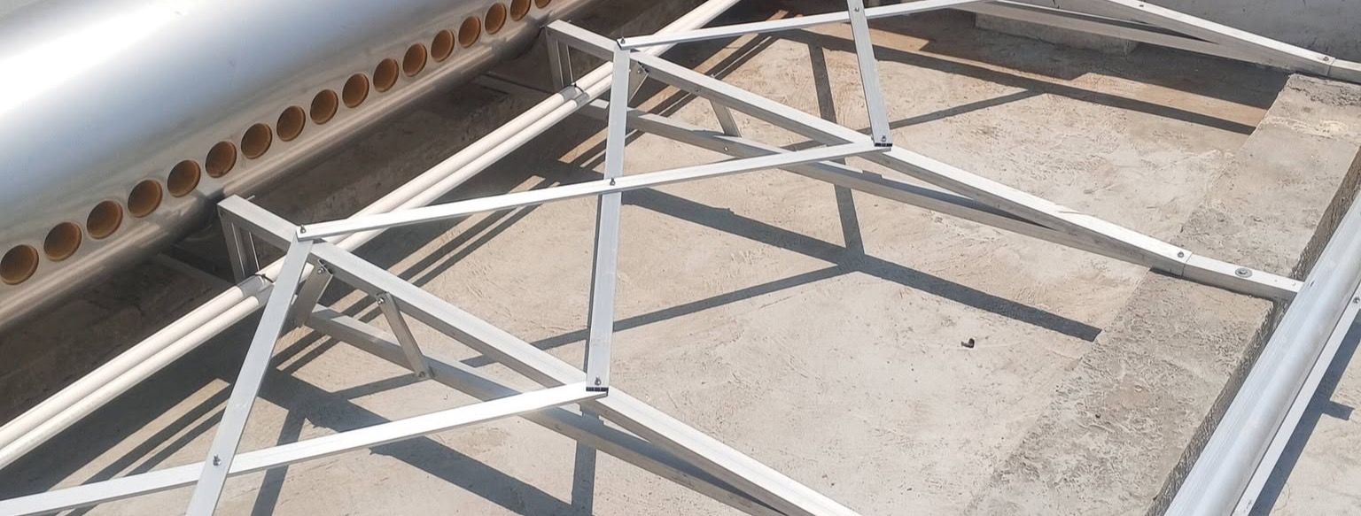 Solar water heater and mounting frames on a rooftop deck in Siargao